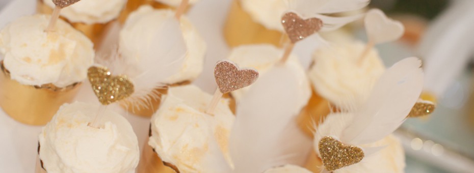 Glittered hearts and feathers cupcake toppers - Love The Occasion